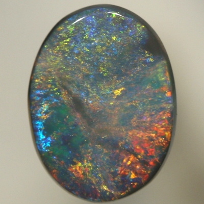 SOLID BLACK OPAL Golden red orange contrasted by turquoise blue. SEE VIDEO